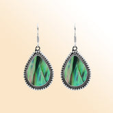 Sterling silver teardrop Abalone earrings with shimmering iridescent shell and detailed Bali beaded design, handcrafted artisan jewelry for women.